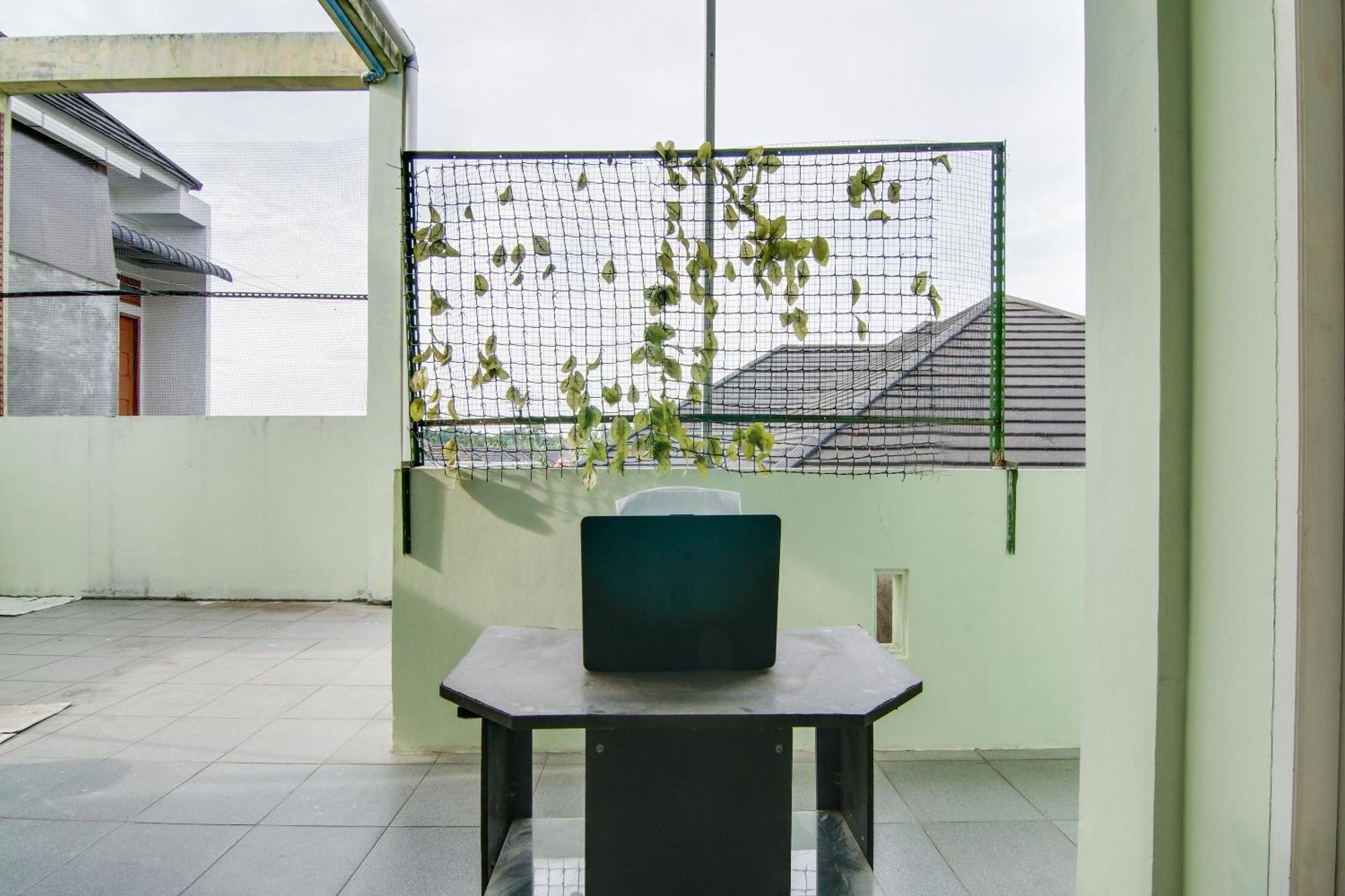Spot On 91858 Raja Homestay Syariah Pekanbaru Exterior foto