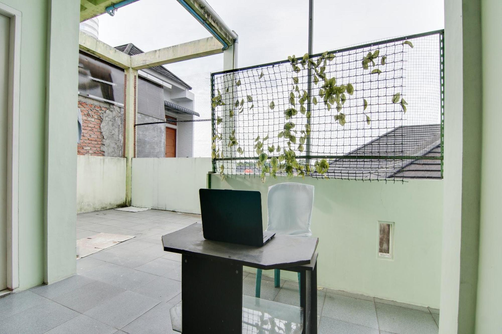Spot On 91858 Raja Homestay Syariah Pekanbaru Exterior foto