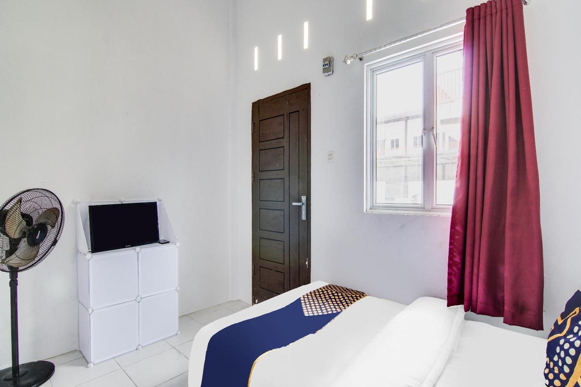 Spot On 91858 Raja Homestay Syariah Pekanbaru Exterior foto